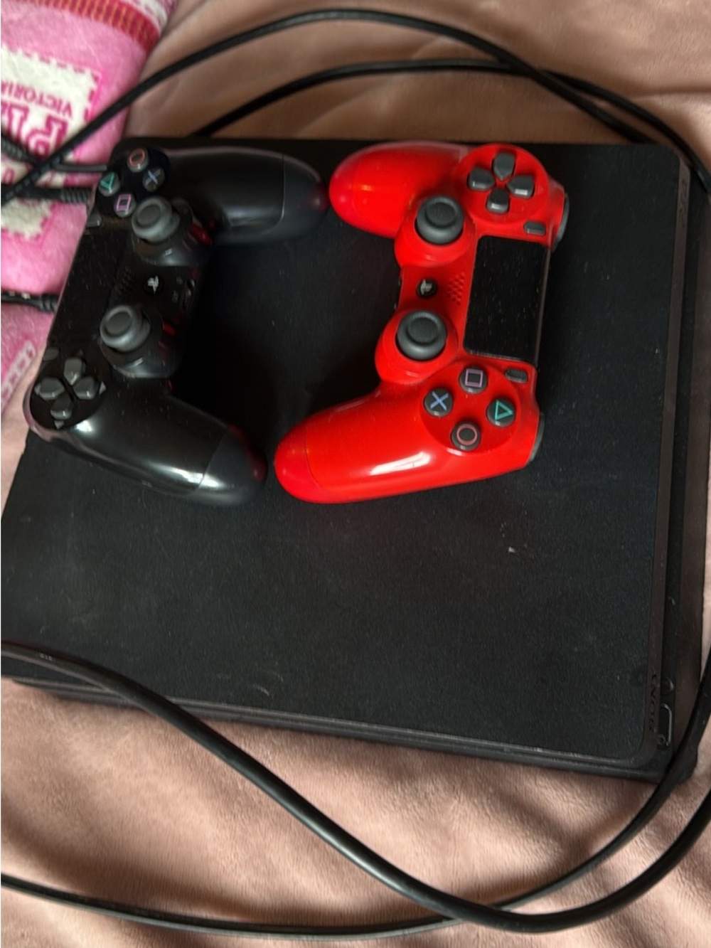 Sony Black Slim Console with Black and Red Controllers